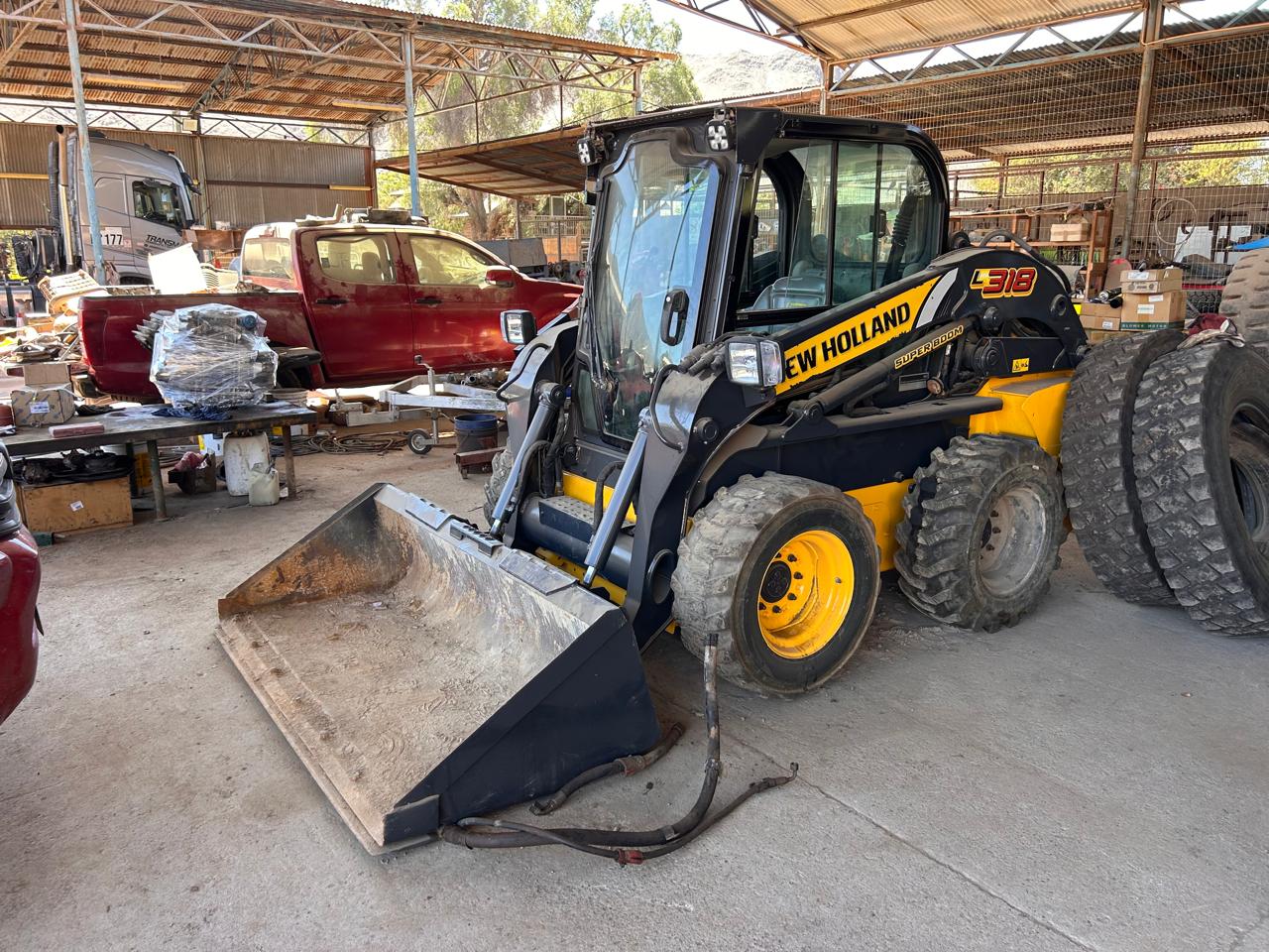 Minicargador New Holland L318 2022 - 1.600 horas